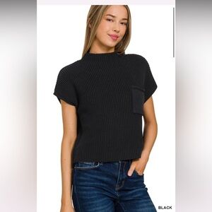Black short sleeve ribbed sweater with pocket and back seam